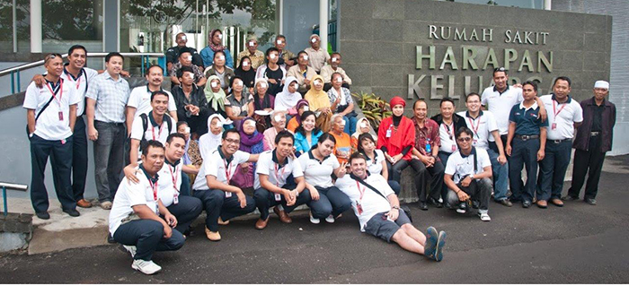 JFF_Staff and patients with eye bandages outside the Harapan Keluarga hospital